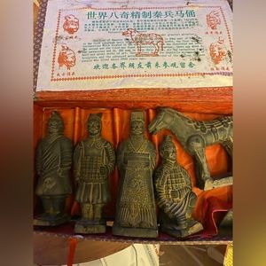 Terracotta warriors and the miniature mask to ward off